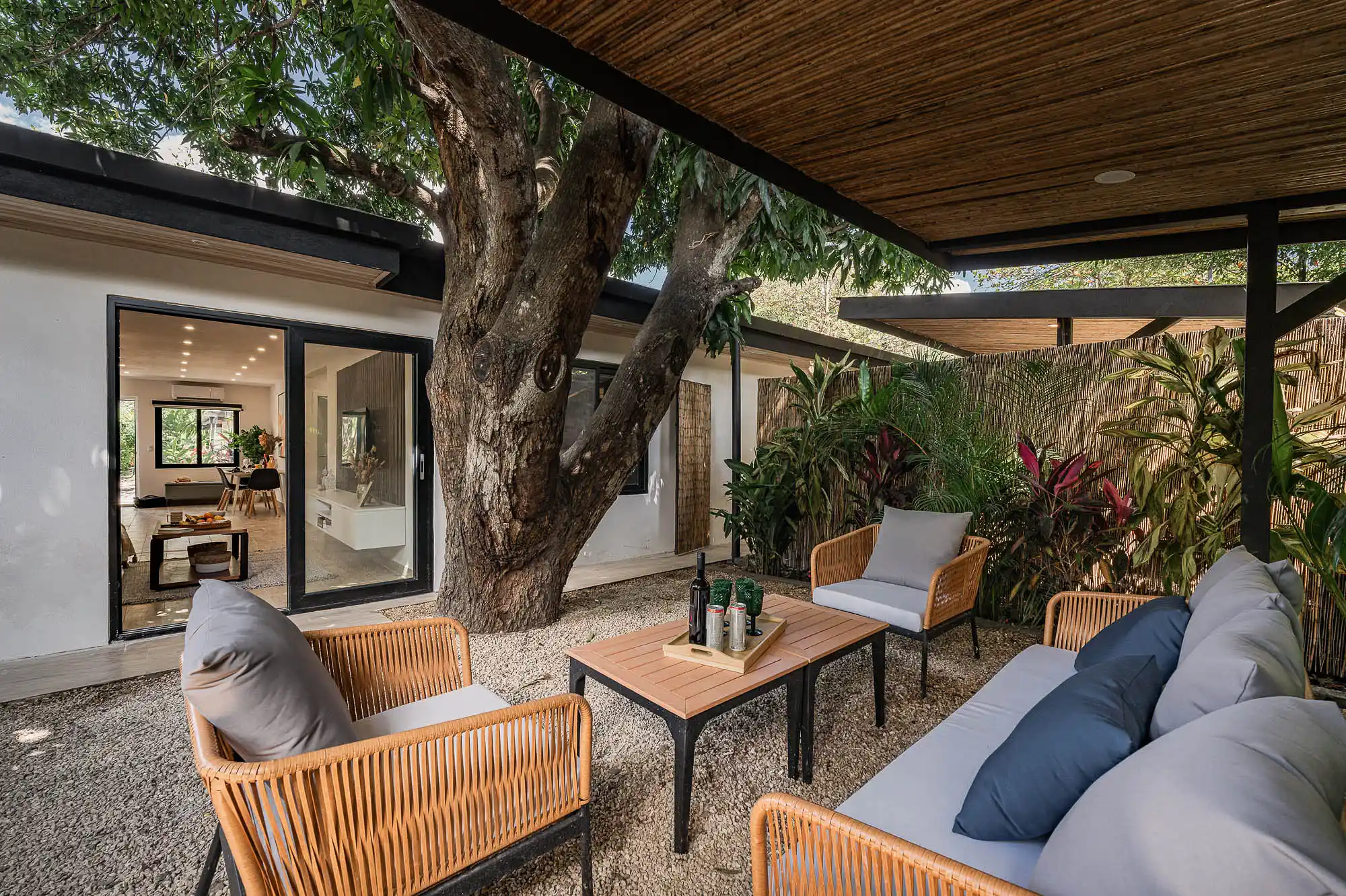 Modern tropical outdoor lounge design by Nargiza Usmanova, Encanto Residences, Costa Rica